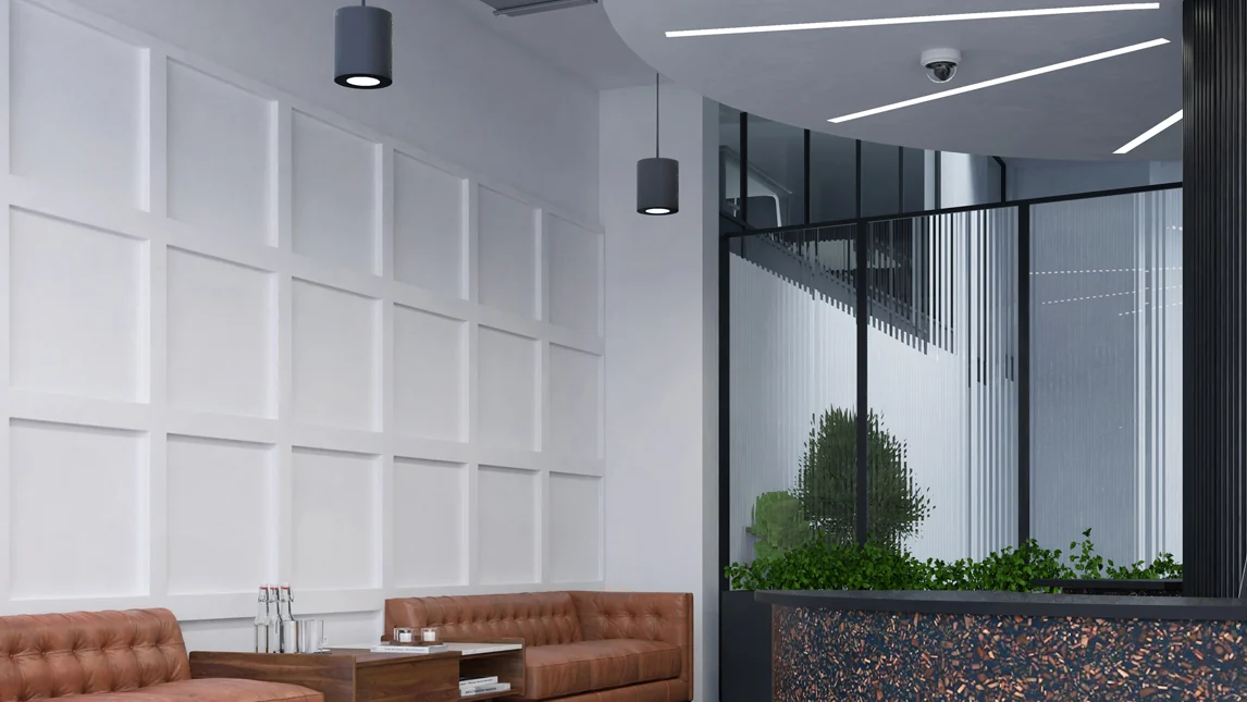 Trimless recessed linear lighting in an office ceiling
